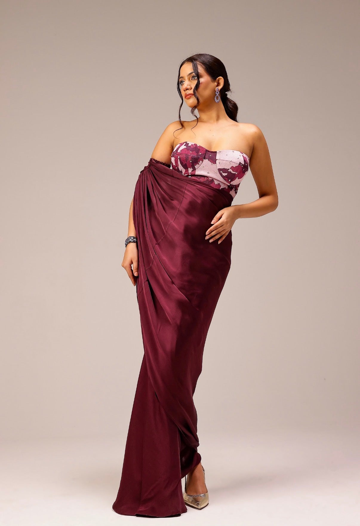 Wine Draped Saree Paired With Hand Embellished Blouse