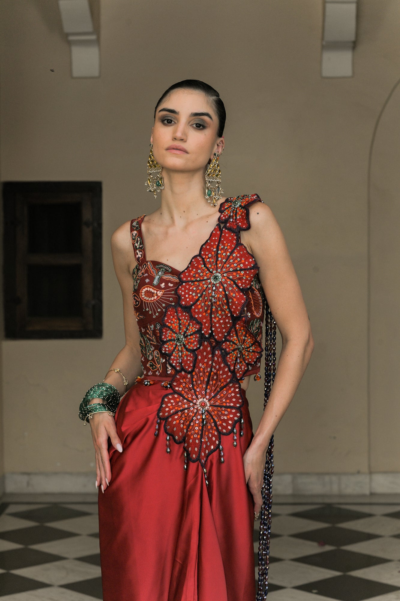 Scarlet Dhoti Skirt Flower Patch Tassel Saree Paired With Thread Work Highlight Corset Blouse