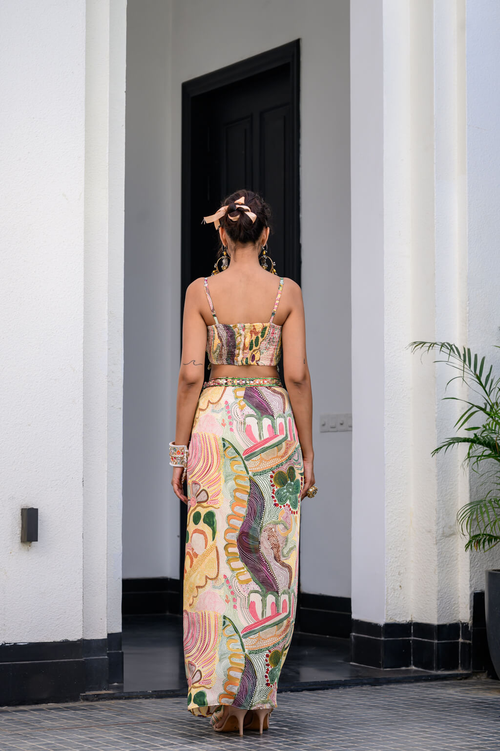 Flora highlighted Bralette Paidawn With Dhoti Skirt Applique Cape Set