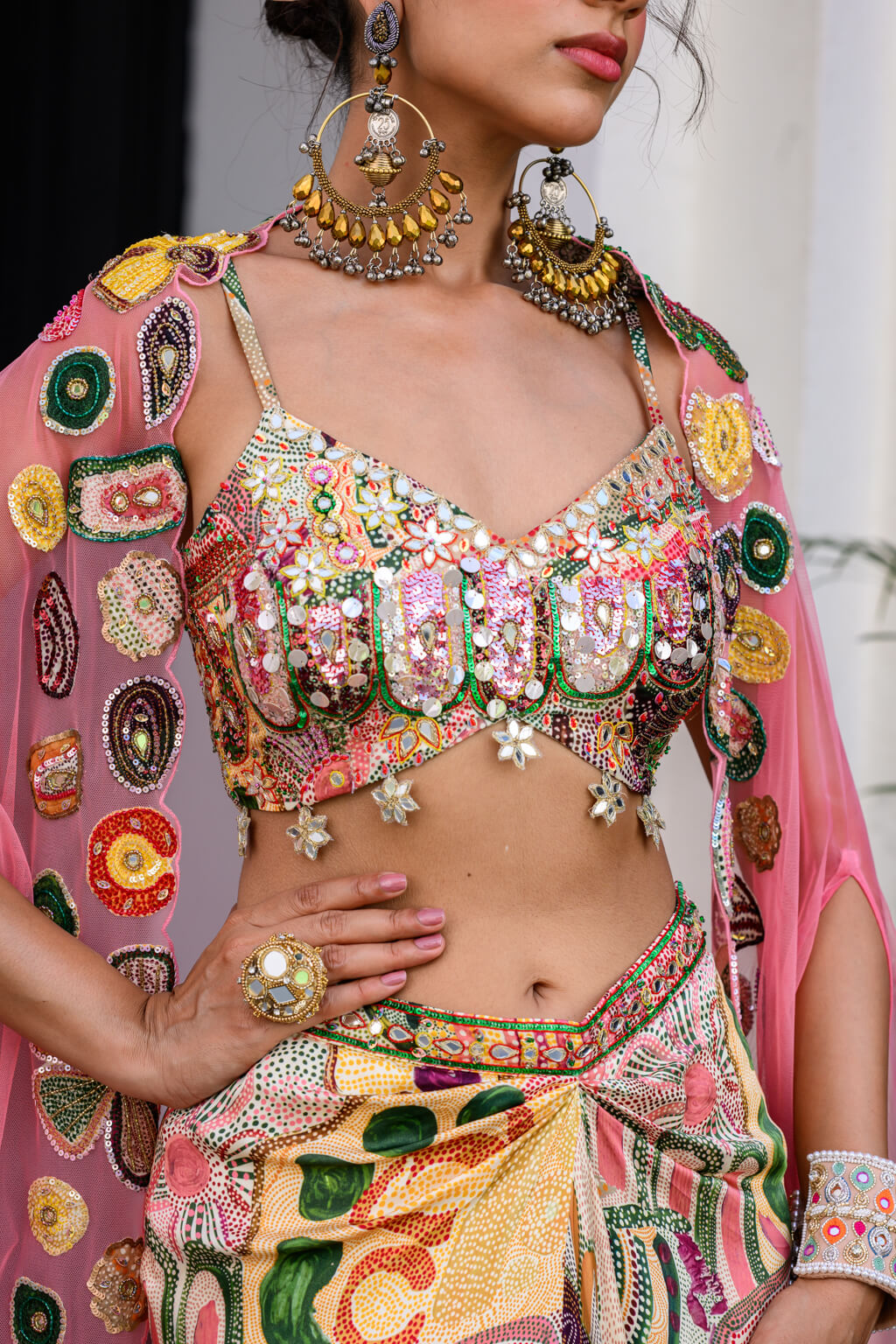 Flora highlighted Bralette Paidawn With Dhoti Skirt Applique Cape Set