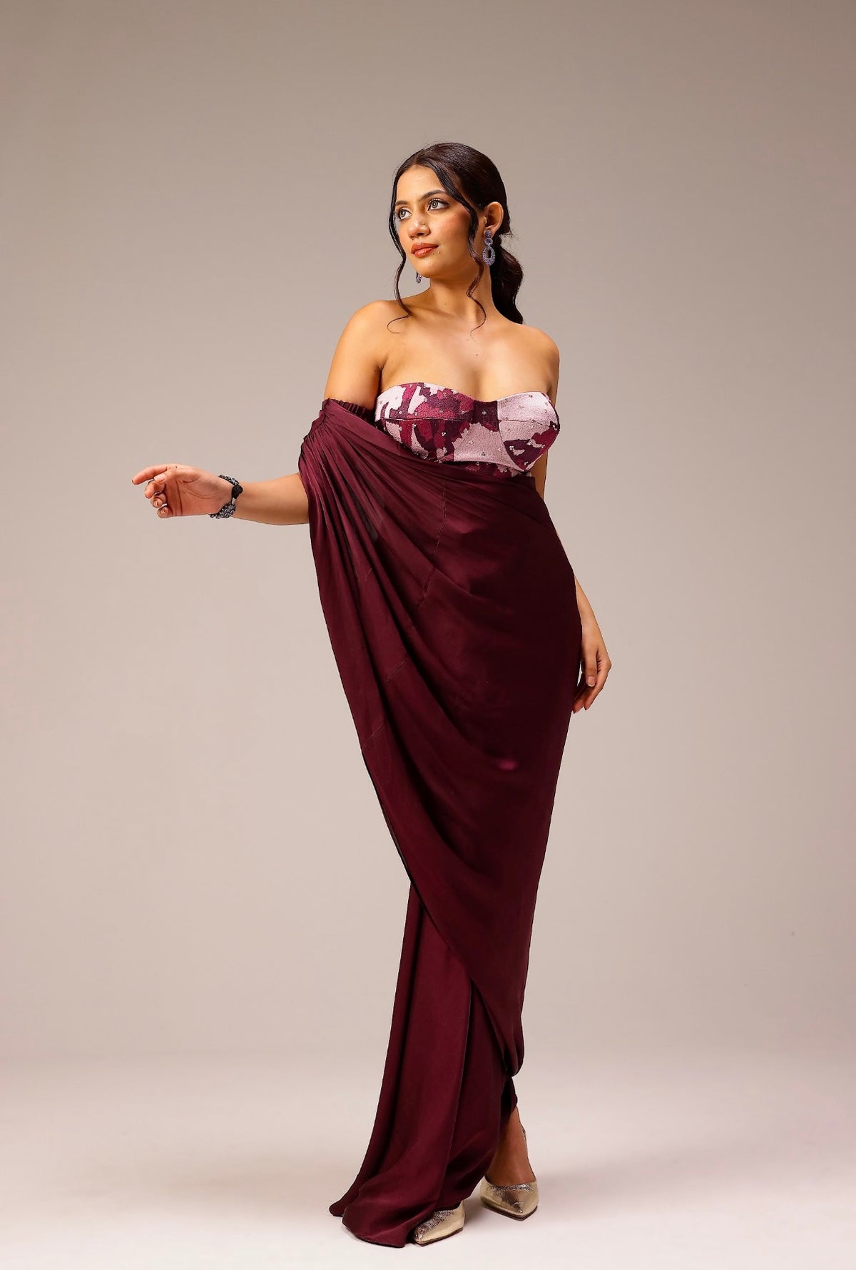Wine Draped Saree Paired With Hand Embellished Blouse