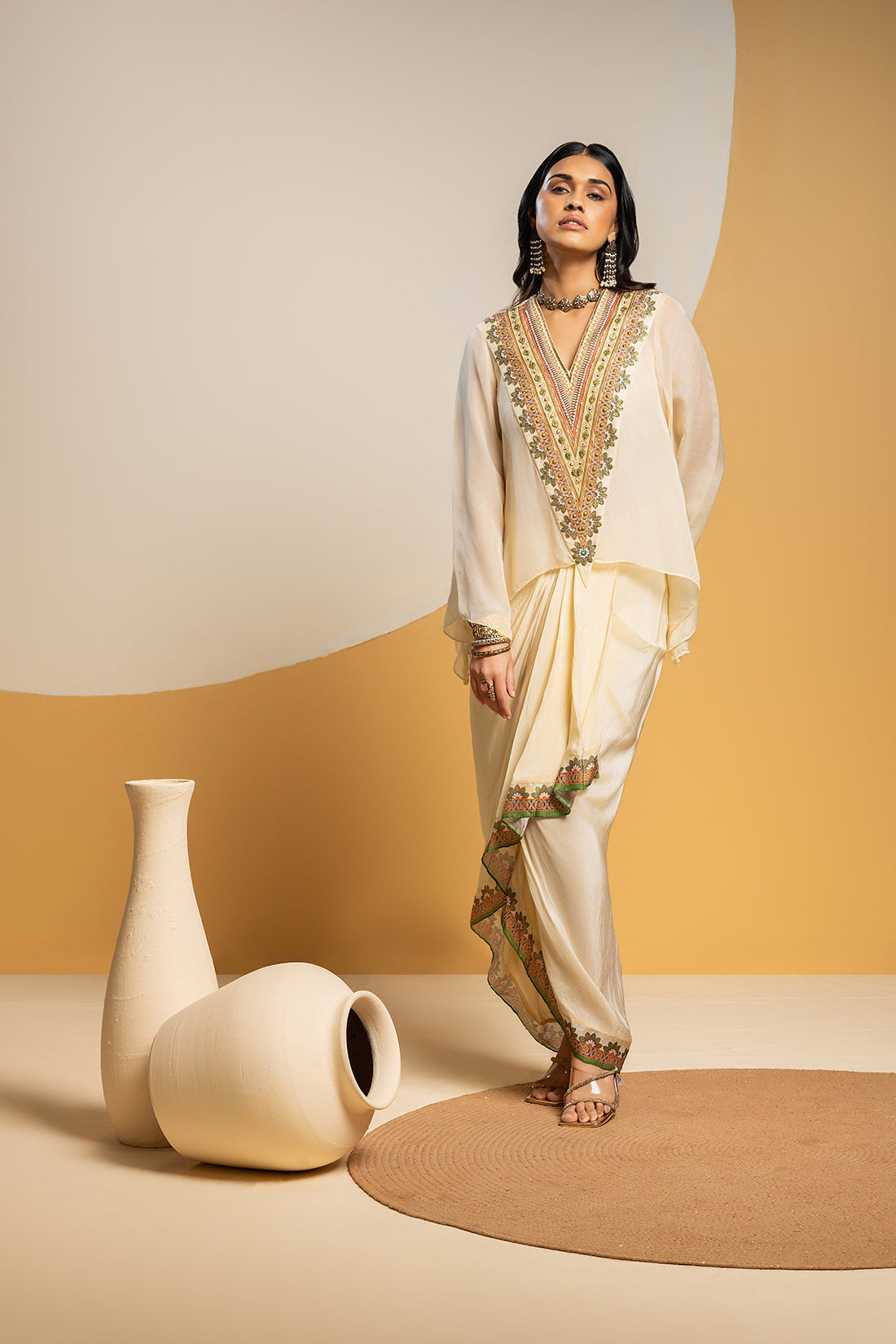 TAARANI OFF WHITE EMBELLISHED V NECK DRAPE SKIRT SET