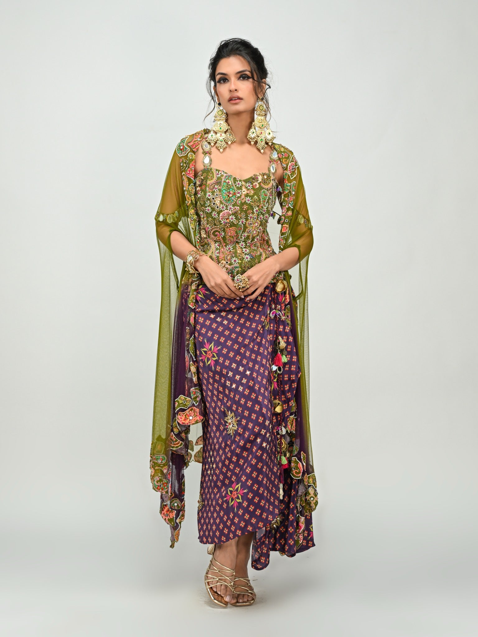 Isha Multani in Olive Badla Embroidered Corset with Plum Dhoti Skirt Set and Cape