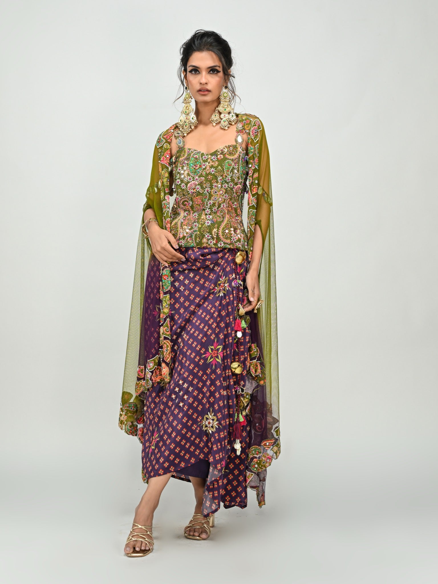 Isha Multani in Olive Badla Embroidered Corset with Plum Dhoti Skirt Set and Cape